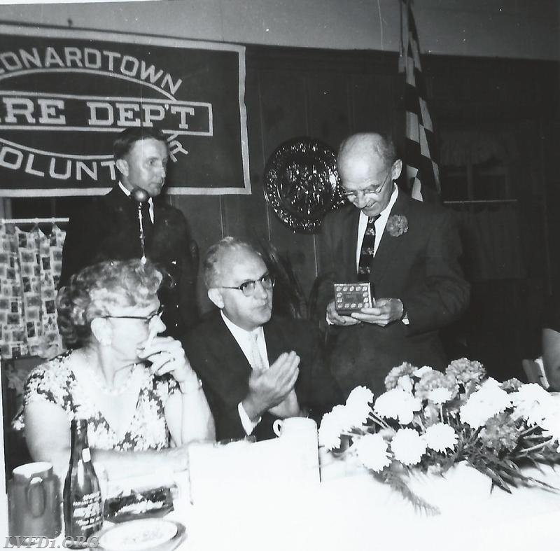 1959: Remarks by Clinton B. Duke at Testimonial dinner for Col. Duke. Looking on Chas.& Laverne Fenwick.